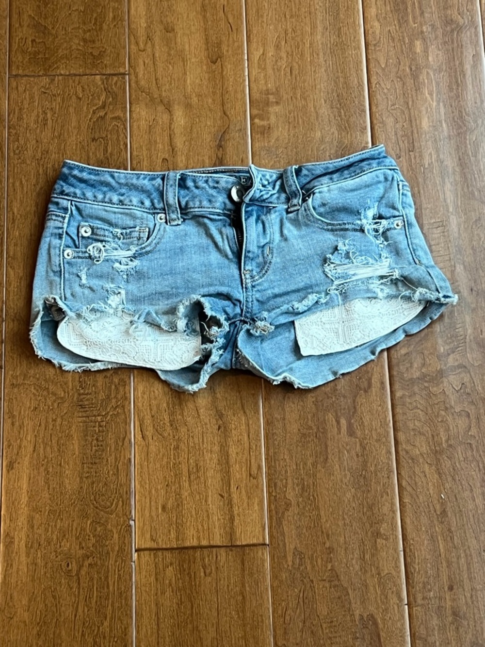 American Eagle Distressed Light Blue Denim Women's Shorts with Lace Inset